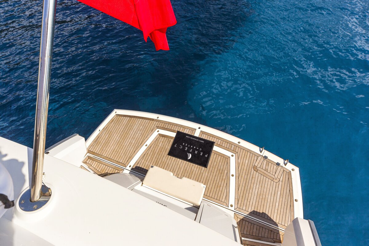 A perfect yachts towel is on the deck of a boat
