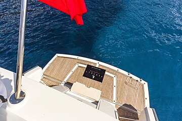 A perfect yachts towel is on the deck of a boat