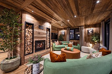 A living room filled with furniture and a fireplace