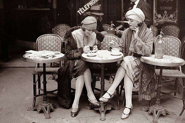 two women at a cafe in Cafe Society in the 1920s Paris