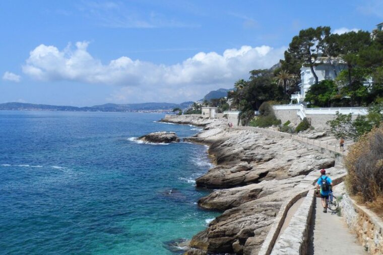 a footpath bordering the sea in Nice