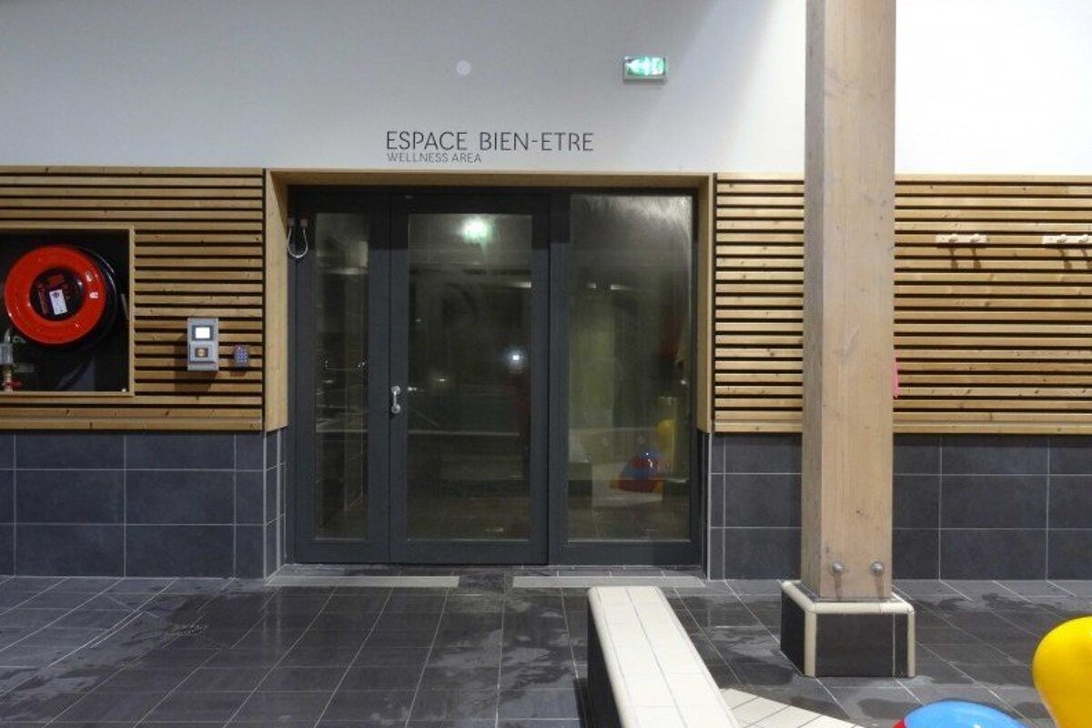 a door to a spa