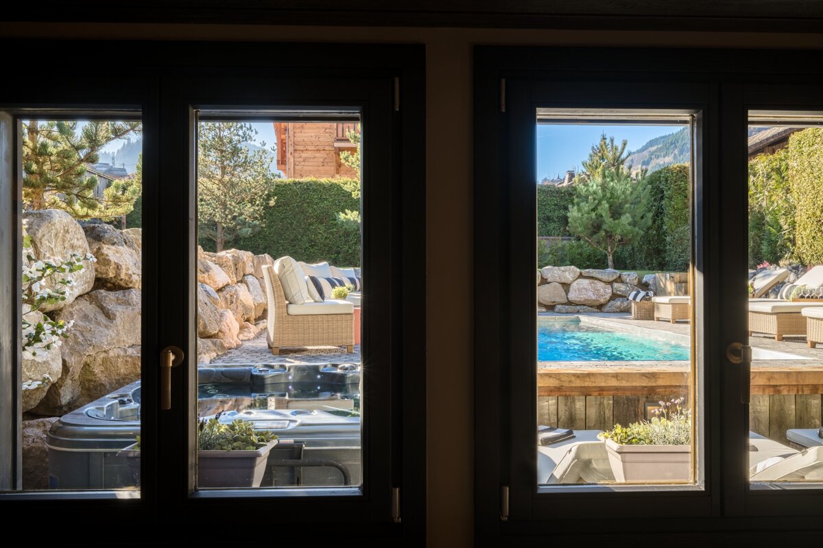 A view of a swimming pool through a window