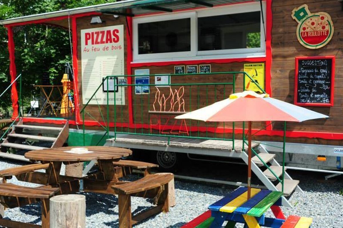 a cabin serving pizza
