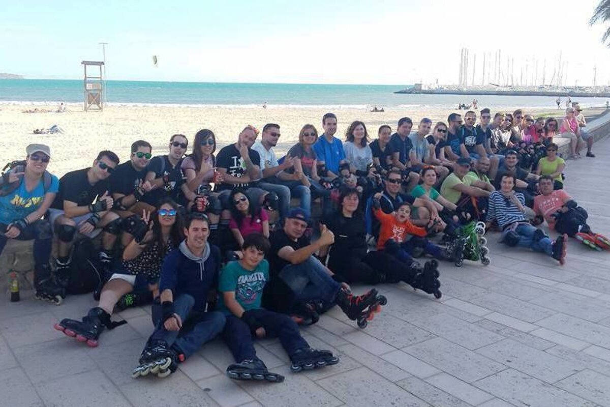 a large group of roller skaters by the beach in palma