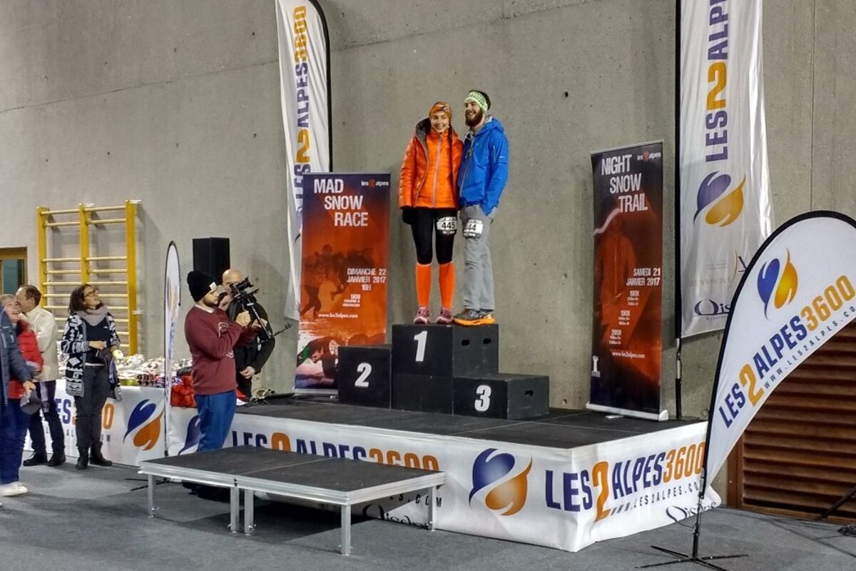 runners on a winners podium