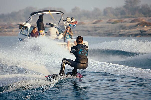 A person in a wetsuit with the word jet ski on the back