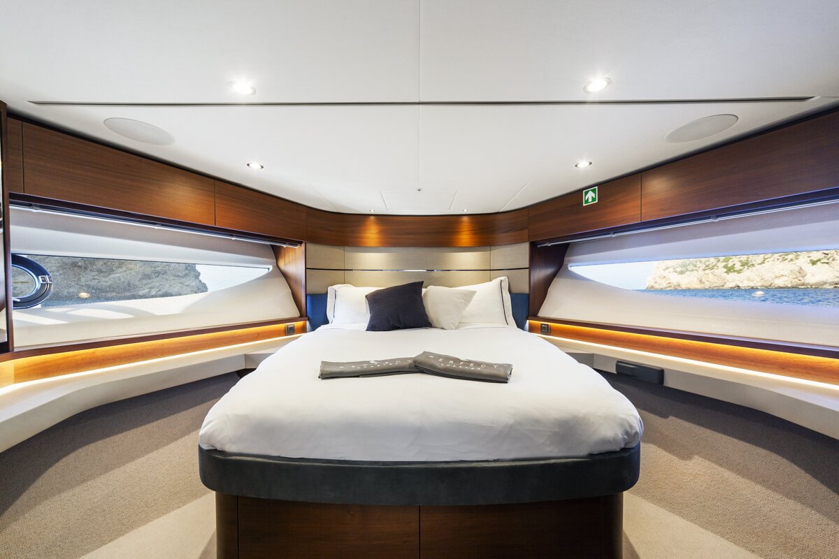 A bedroom with a bed and a sign that says ' escape ' on it