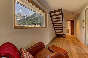A staircase leading up to the second floor of a house
