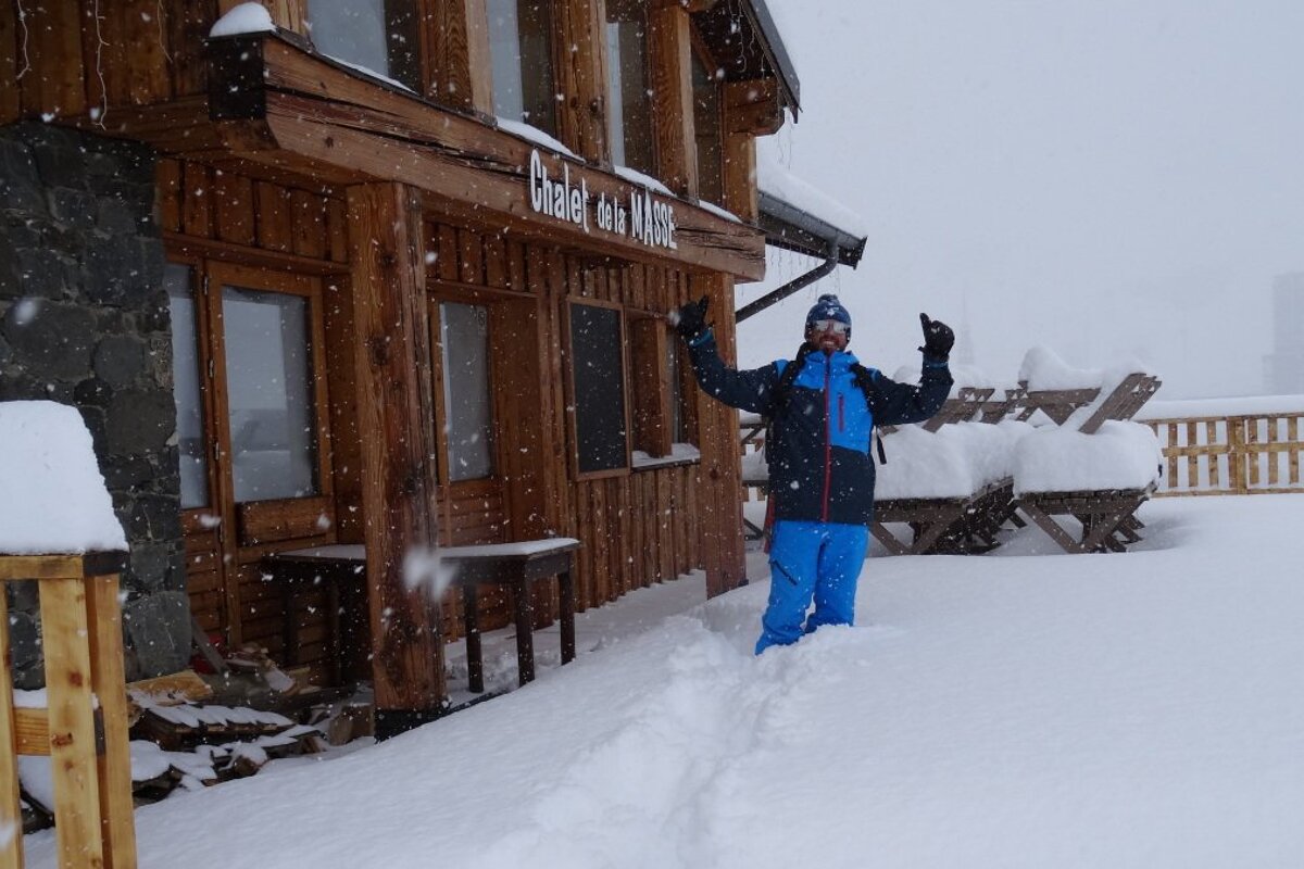snow on a chalet terrace