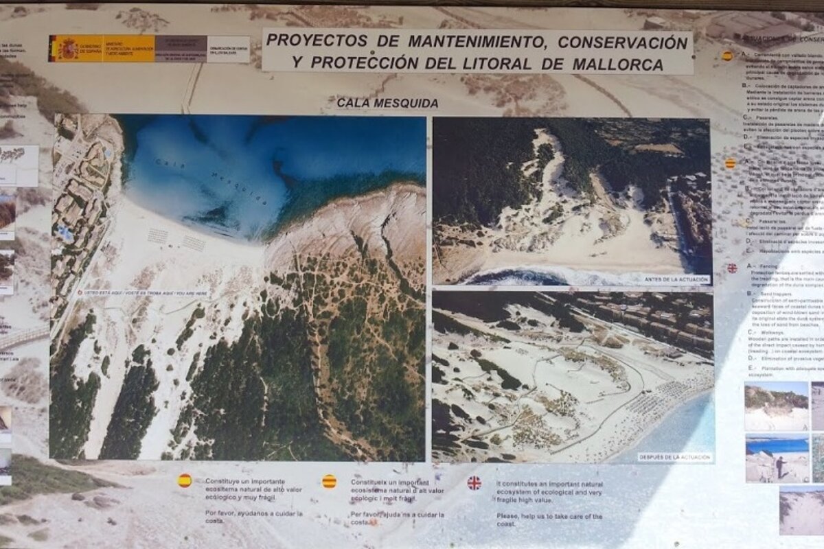 a sign on a beach in mallorca