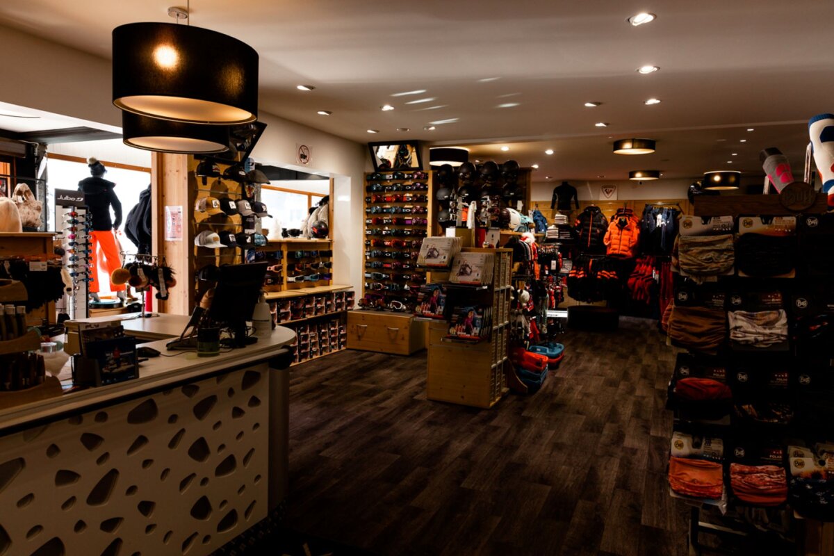 A store with a sign that says ' altitude ' on it