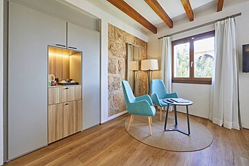A room with two chairs and a small table
