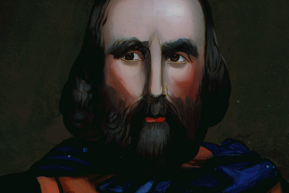A painting of a man with a beard and red lips