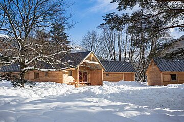 Huttopia's wooden chalets in winter