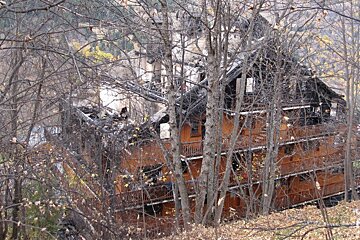 a burnt out apartment building in meribel