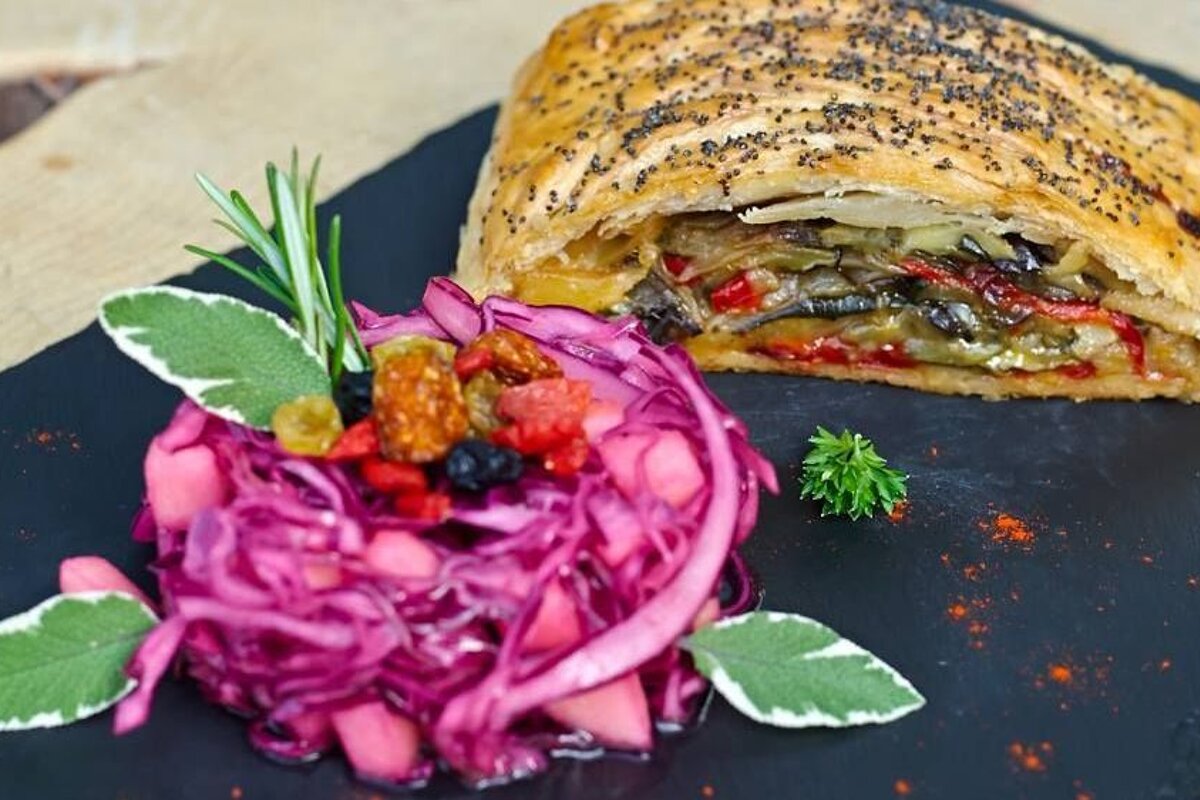 A plate of food with a bunch of vegetables on it