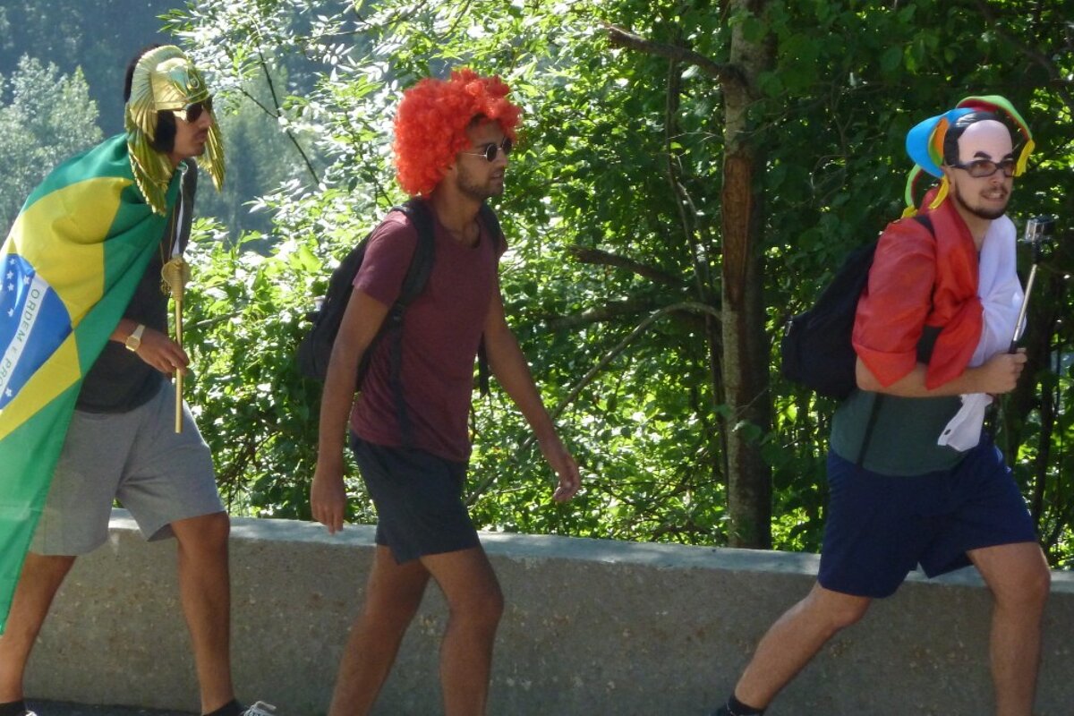 3 guys in fancy dress on alpe d'huez