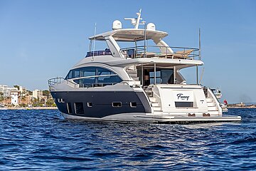 A large yacht with the name franny on the back
