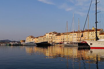 a row of yachts in st tropez marina