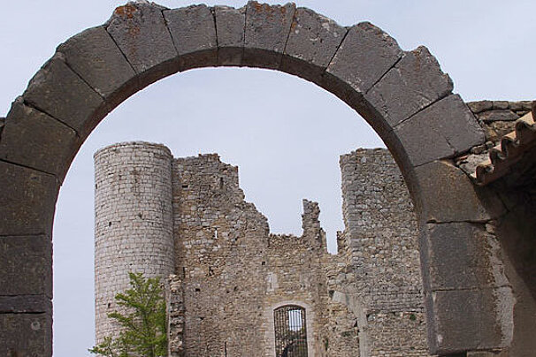 a stone arch in ruins