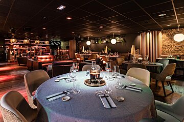 A restaurant with the word sma on the ceiling