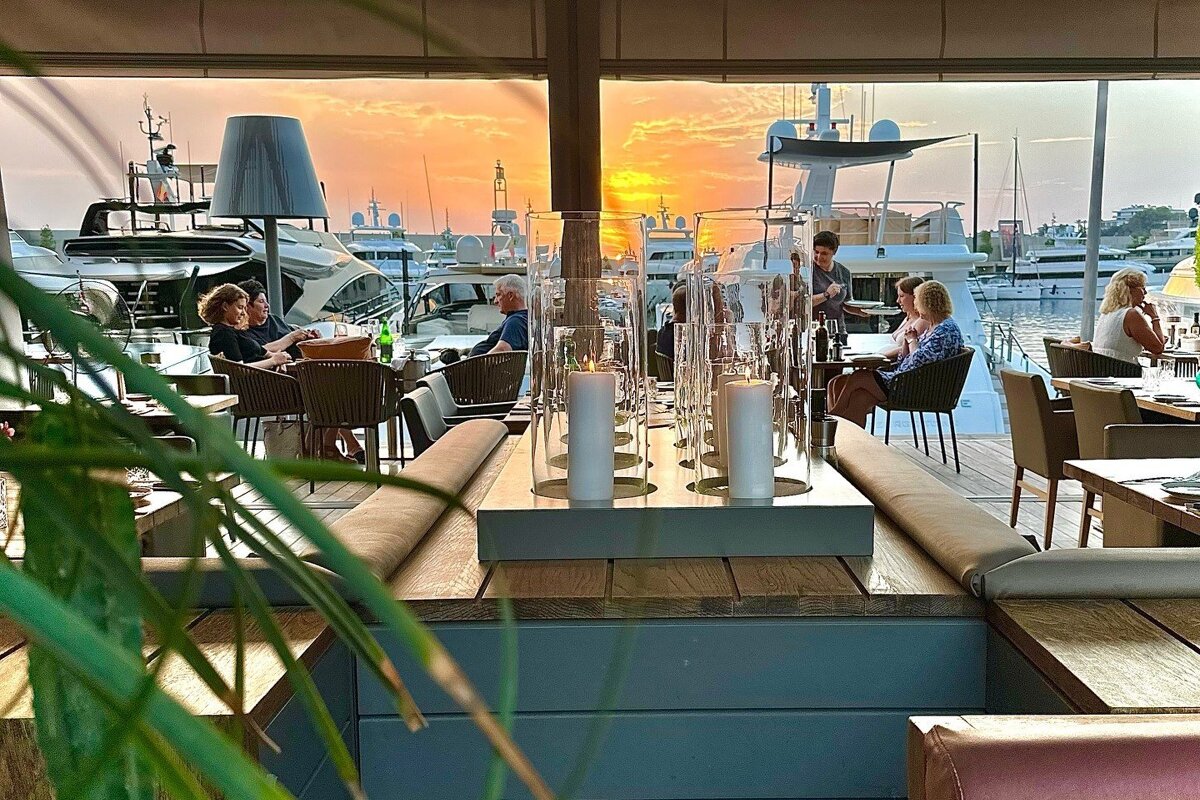 Looking out onto the terrace at sunset at Harbour Grill