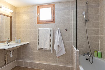 A bathroom with a sink and a bathtub