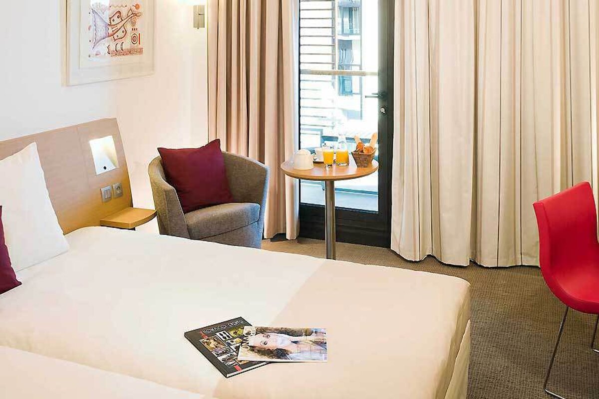 a picture of a hotel suite at Novotel Monte-Carlo, Monte-Carlo