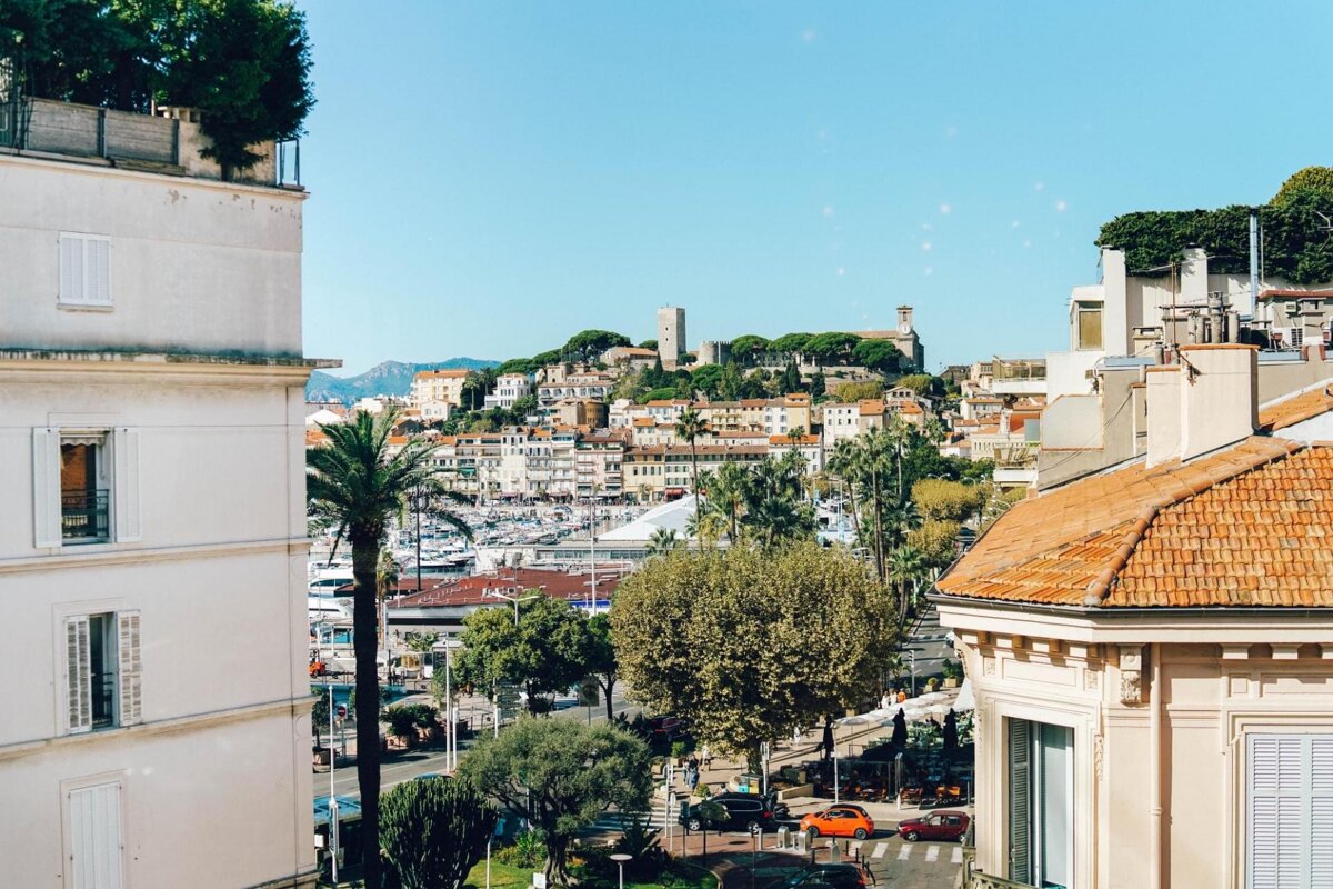 A view of a city from the top of a building