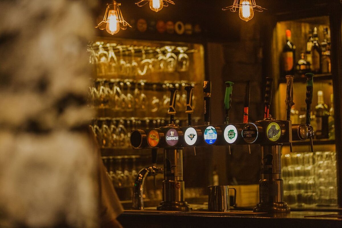 A bar with a guinness tap on it