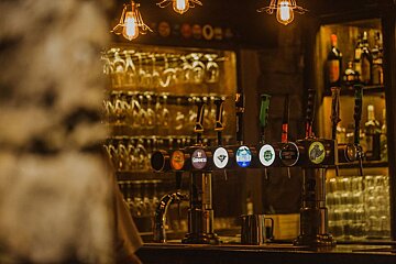 A bar with a guinness tap on it