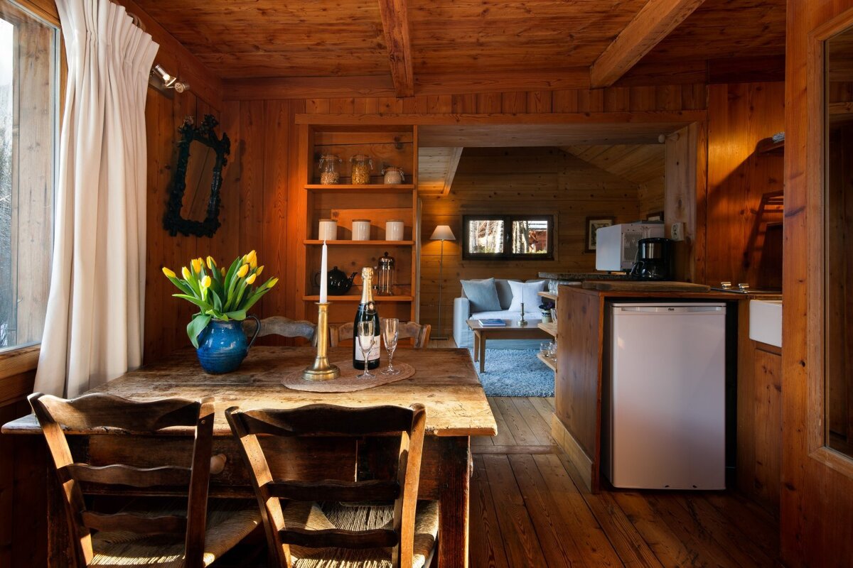 A table with a bottle of champagne on it