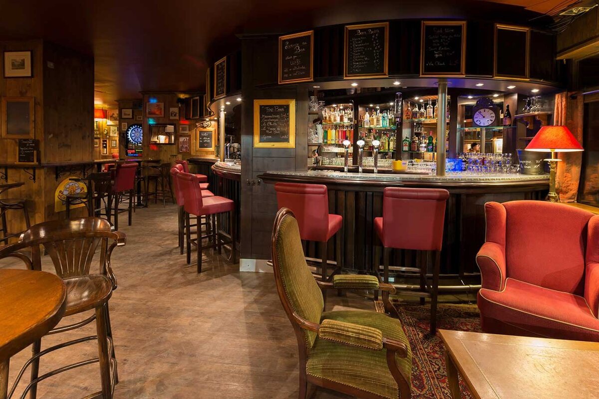 A bar with a chalkboard that says 