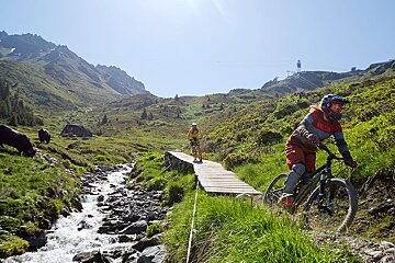 two mountain bikers on a trail in Verbier
