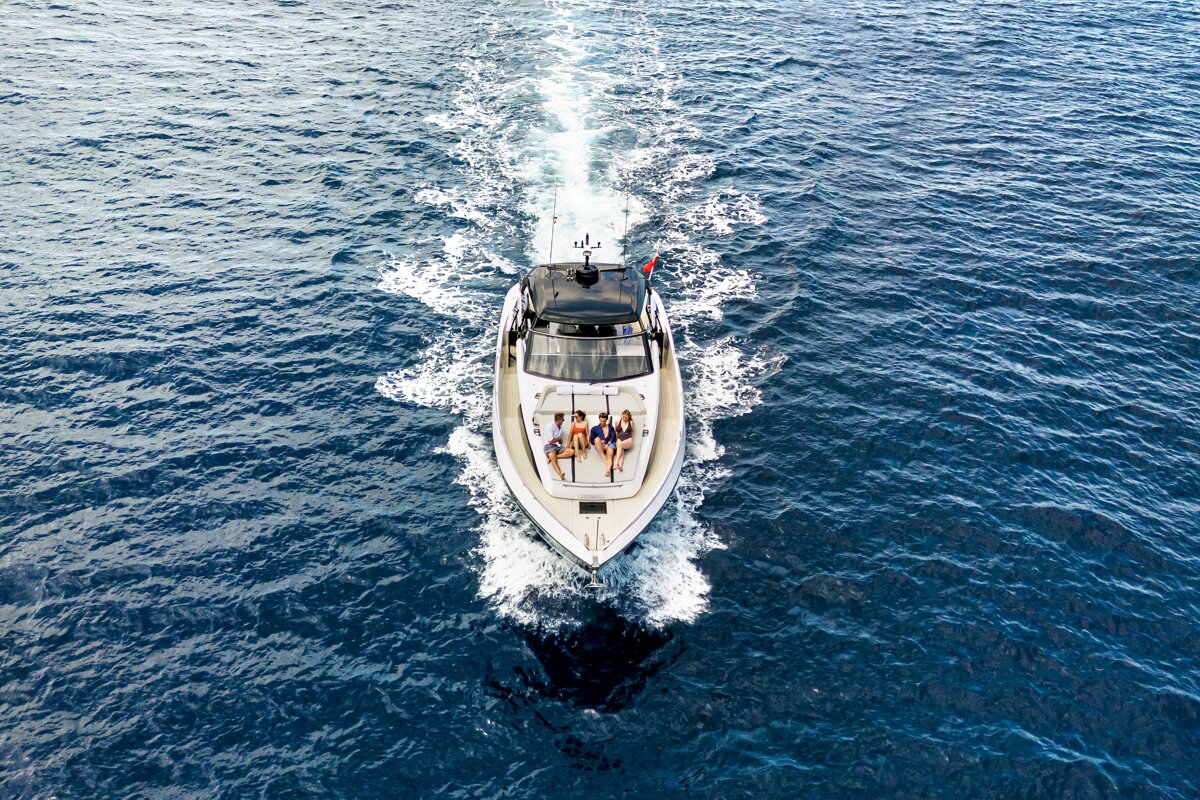 An aerial view of a boat in the ocean