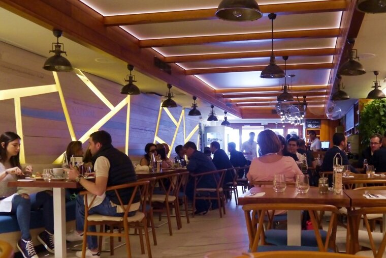 the interior seating at eqvita restaurant in monaco