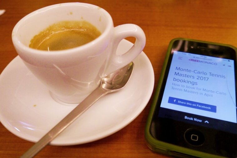 coffee cup with mobile phone at eqvita monaco