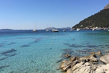 boats moored off the coast of north mallorca