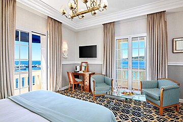 A hotel room with a view of the ocean