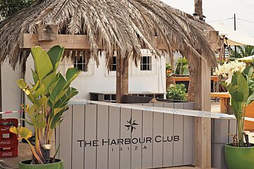 the entrance of a beach club in talamanca