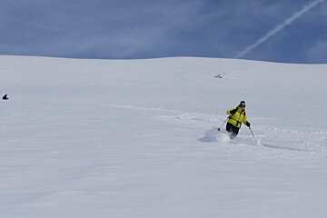 two skiers off piste