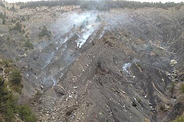 smoking debris on a moountain