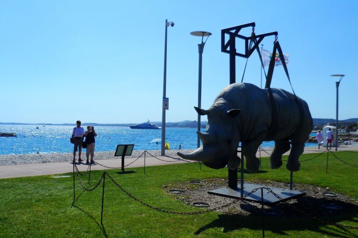 a rhino sculpture near the sea in Nice