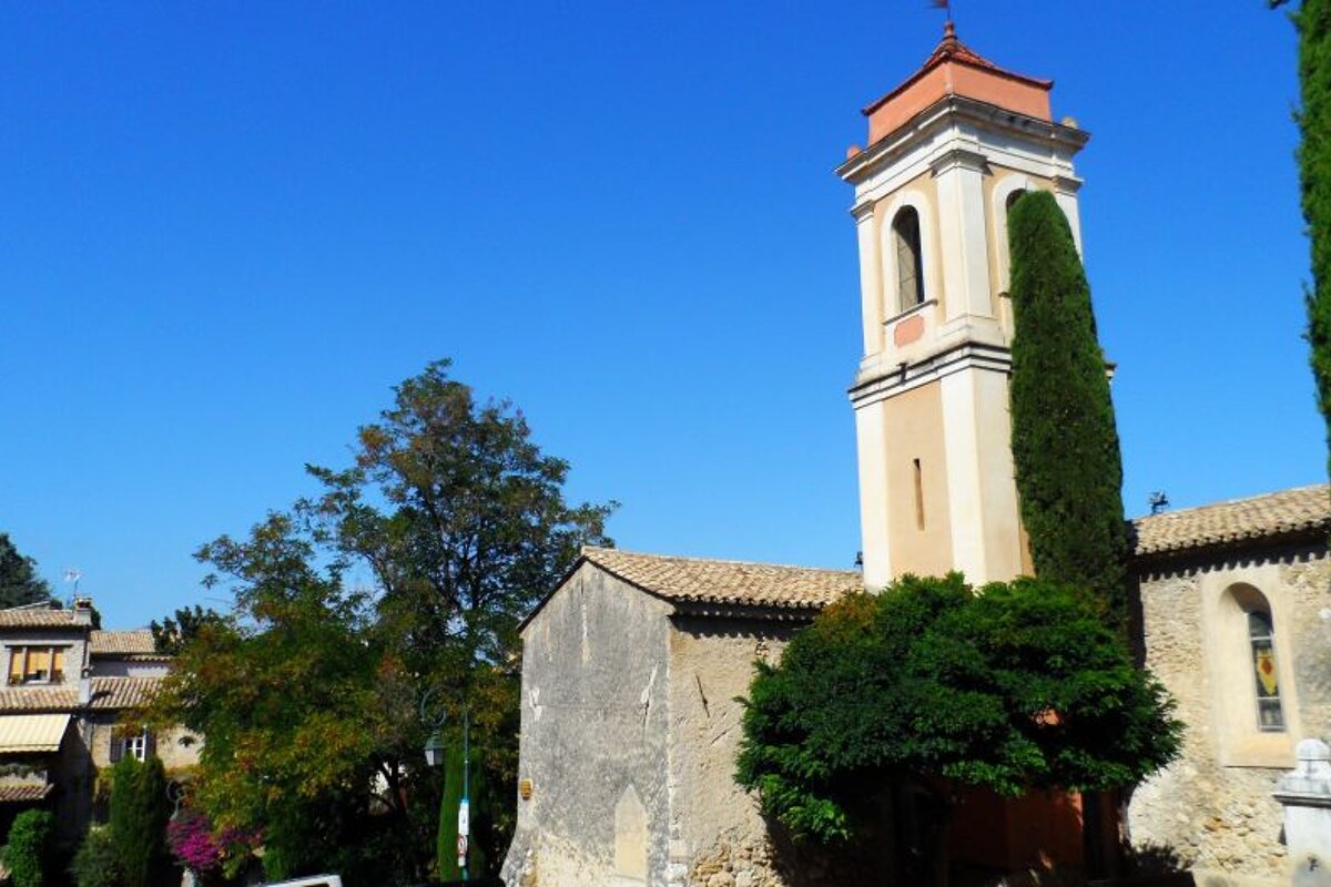 a church with a tower in Cagnes su Mer