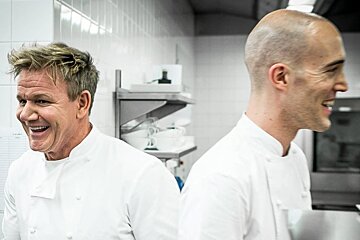 chef gordon ramsay and his team in the kitchen