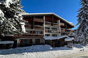 A hotel called l' igloo is covered in snow
