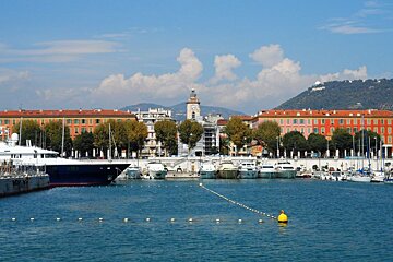 a large motor yacht parked up in a harbour
