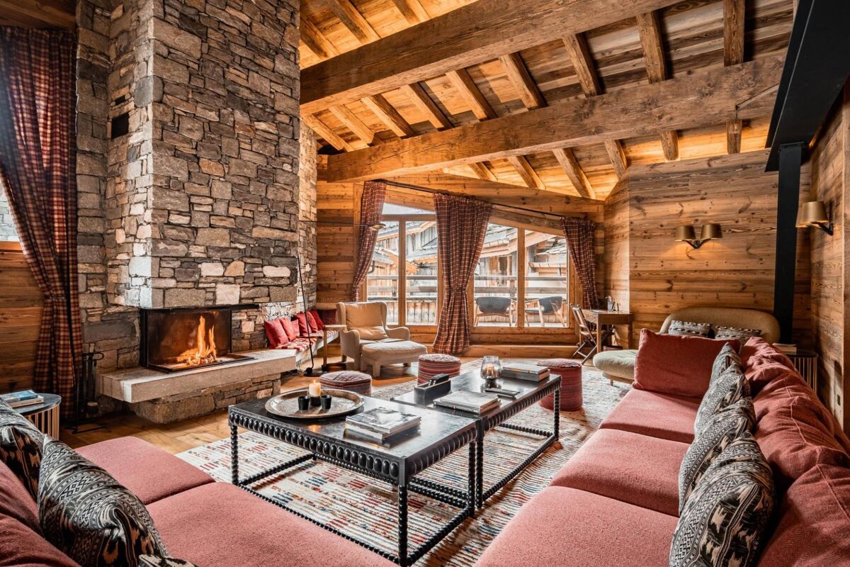 A living room with a fireplace and a couch