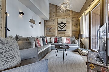 A living room with a couch and a stop sign